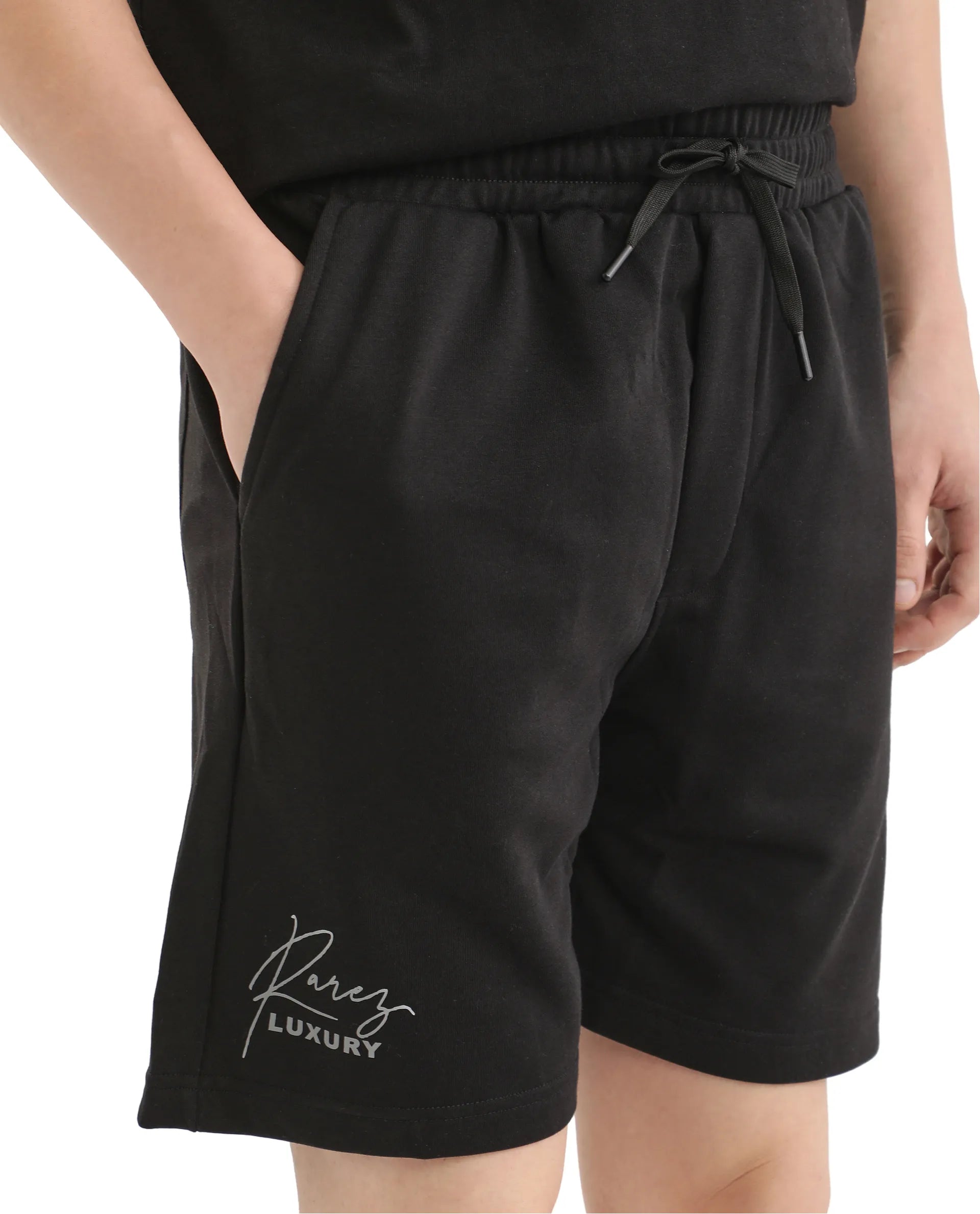 Men's Pants with Faux Leather PatchesRare Rabbit Men Cade-B Black Cotton Fabric Drawstring Closure Oversized Fit Plain Shorts Men's Pants with Faux Leather PatchesRare Rabbit Men Cade-B Black Cotton Fabric Drawstring Closure Oversized Fit Plain Shorts