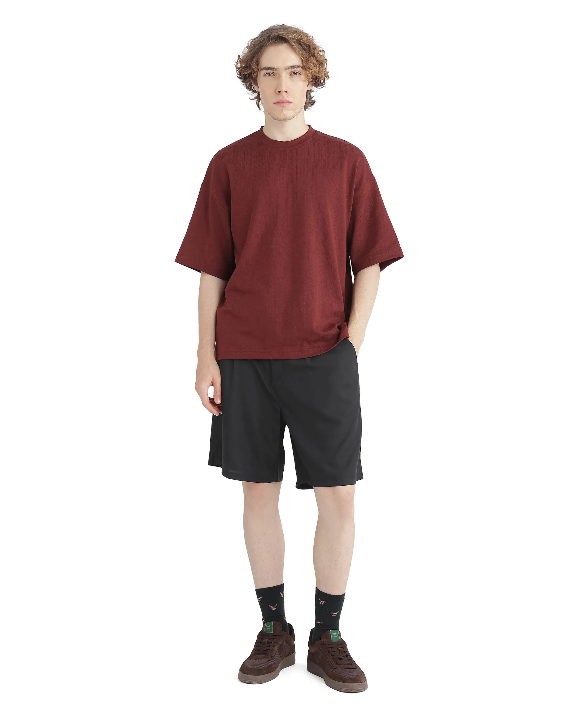 Men's Low-Waisted Pants for a Casual VibeRare Rabbit Men's Caro-B Black Cotton Fabric Mid Rise Button Closure Oversized Fit Plain Shorts Men's Low-Waisted Pants for a Casual VibeRare Rabbit Men's Caro-B Black Cotton Fabric Mid Rise Button Closure Oversized Fit Plain Shorts