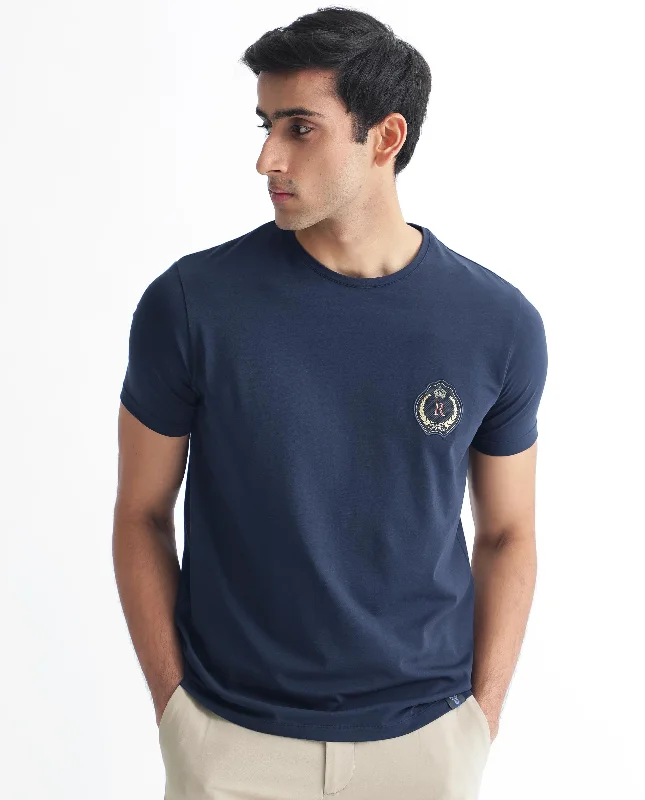 Men's Shirts with Patchwork SleevesRare Rabbit Men's Kos Navy Solid Crew Neck Chest Embroidered Label Branding Half Sleeves Regular Fit T-Shirt