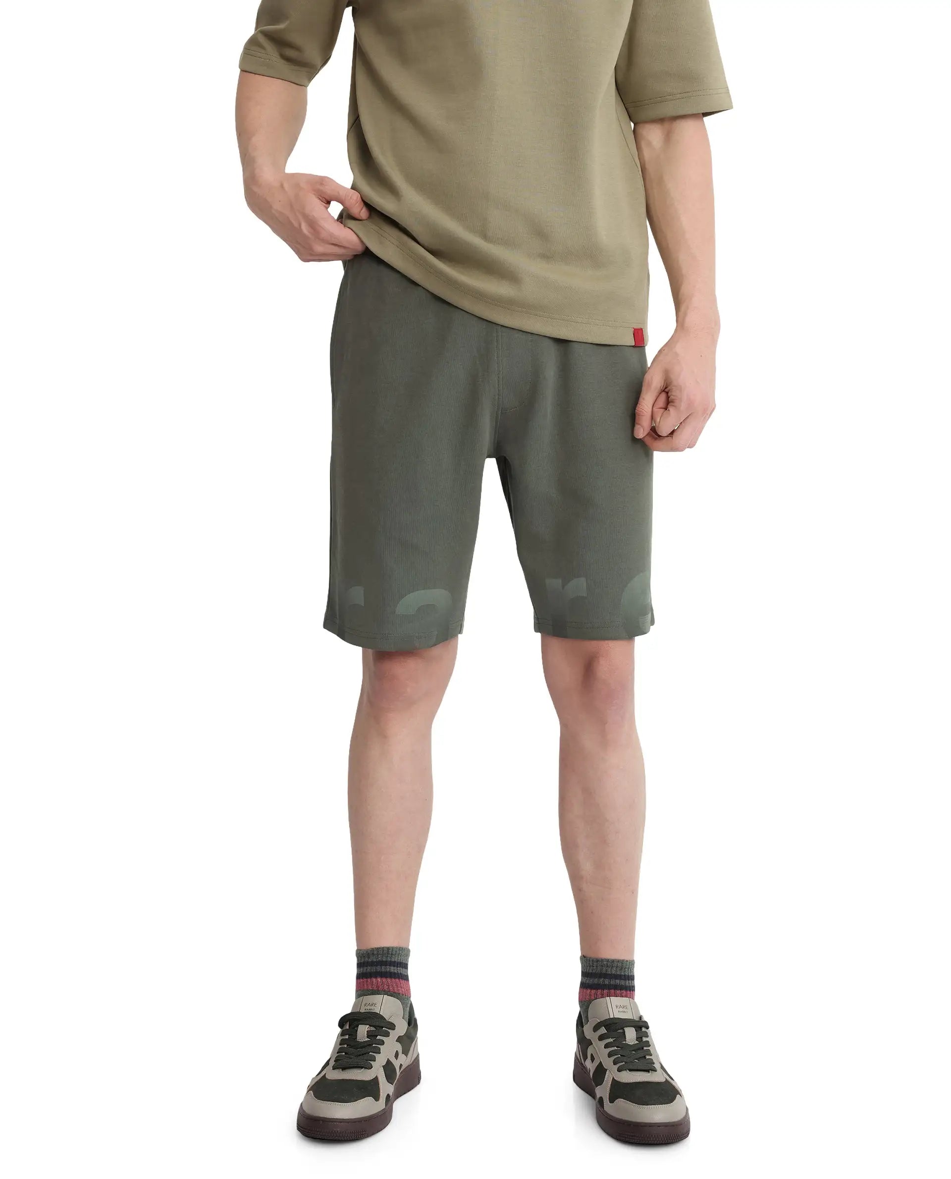 Men's Pants with Hidden ButtonsRare Rabbit Men's Lets Dusky Green Cotton Drawstring Closure Typography Print Shorts Men's Pants with Hidden ButtonsRare Rabbit Men's Lets Dusky Green Cotton Drawstring Closure Typography Print Shorts