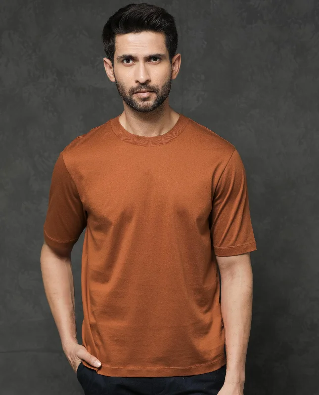 Men's Three-Quarter Sleeved TopsRare Rabbit Mens Barcelon Rust Cotton Fabric Short Sleeves Oversized Fit Solid T-Shirt Men's Three-Quarter Sleeved TopsRare Rabbit Mens Barcelon Rust Cotton Fabric Short Sleeves Oversized Fit Solid T-Shirt